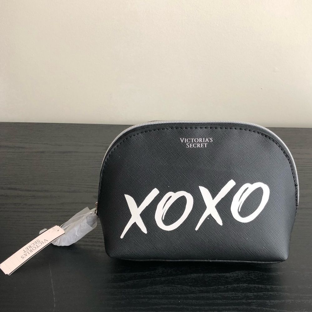 Black and white XOXO make up bag